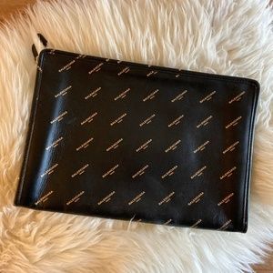 Authentic balenciaga black and gold pouch clutch bag
